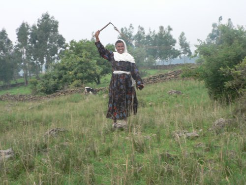 Fisseha\'s grandmother, Tsehai, demonstrates the art of the bullwhip